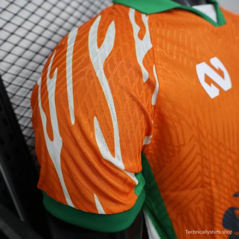 Player Version 2025 Ivory Coast Orange with Elephant Graphic and Green Accents Jersey