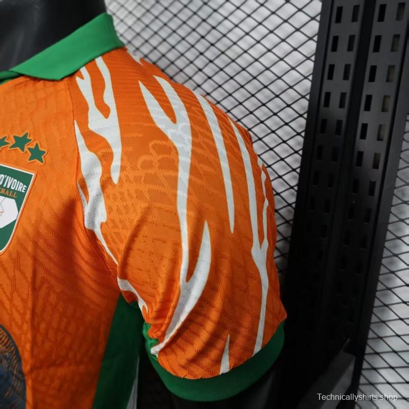 Player Version 2025 Ivory Coast Orange with Elephant Graphic and Green Accents Jersey